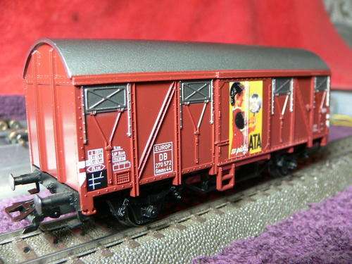Marklin HO covered goods wagon with artwork. Tagged and bagged