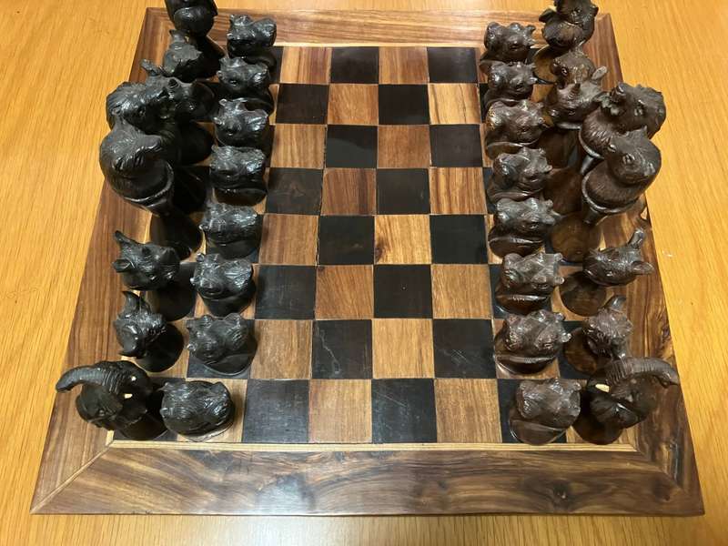 Hand-crafted African wildlife chess set
