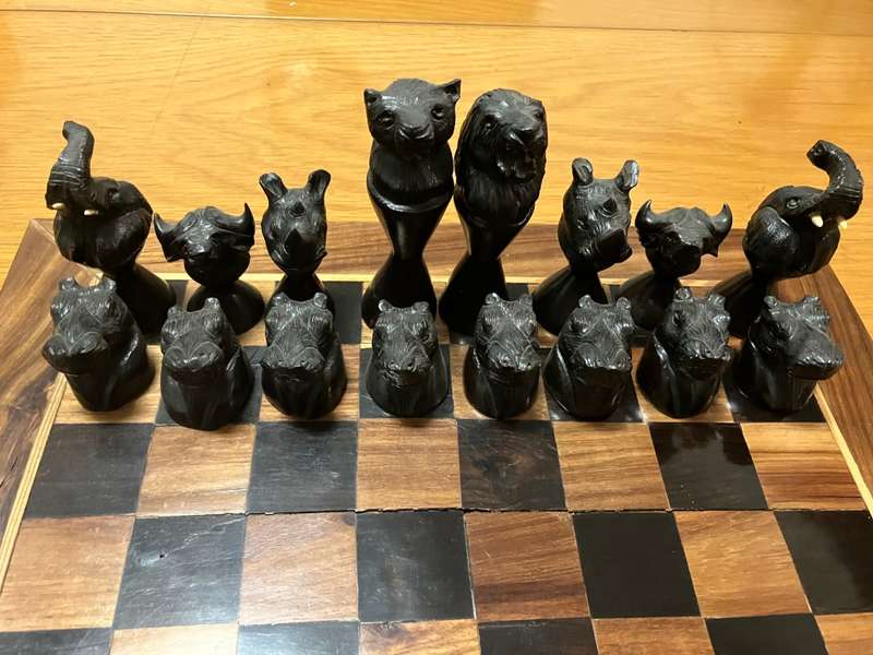 Hand-crafted African wildlife chess set