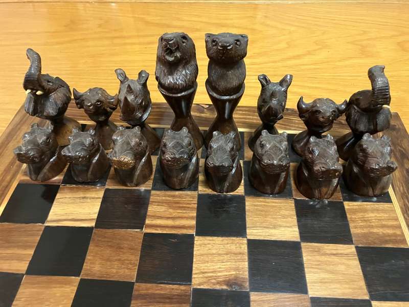 Hand-crafted African wildlife chess set
