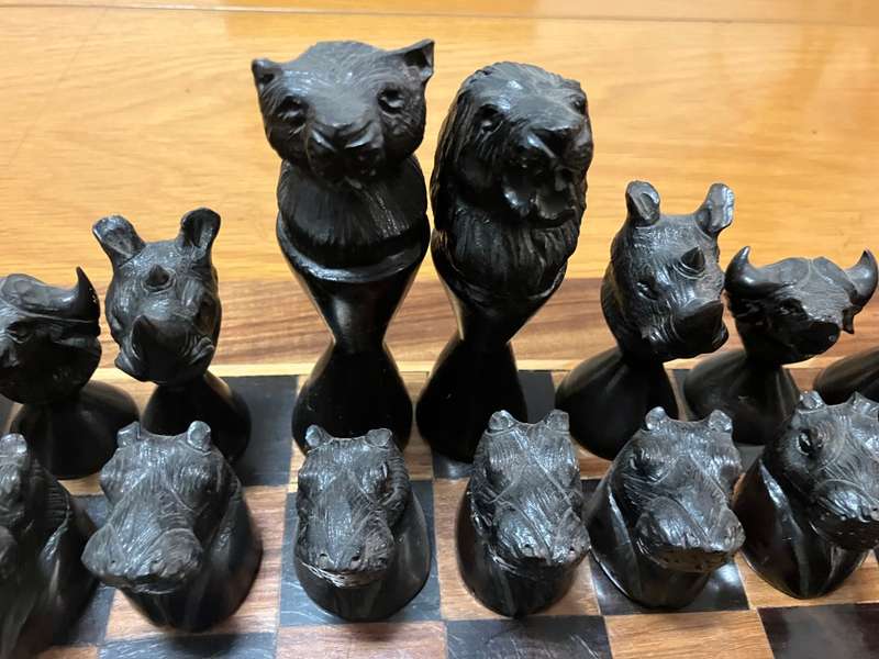 Hand-crafted African wildlife chess set