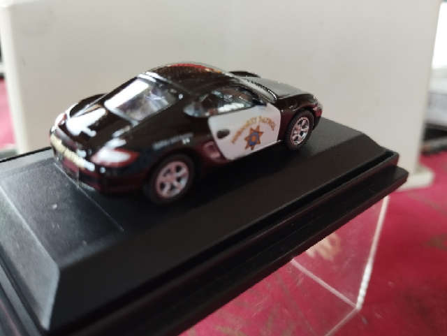 Schuco Porsche Cayman S - Highway Patrol - 1/87 Scale