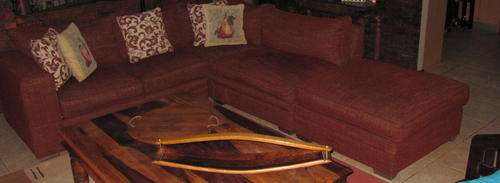 Corner Lounge Unit with big Ottoman in brick red. Very good condition.