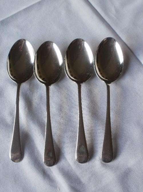 FOUR NICKEL SILVER SPOONS