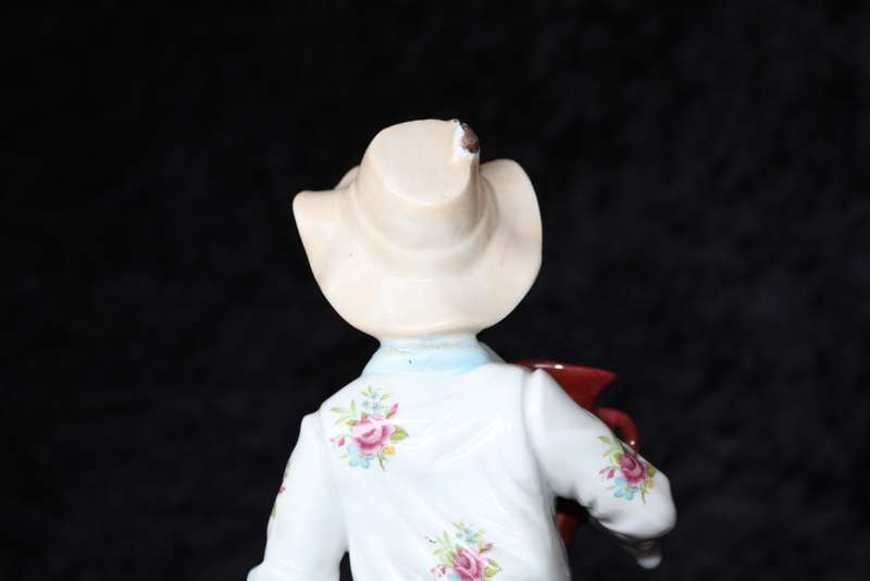 Porcelain Figurine of Boy and Swan