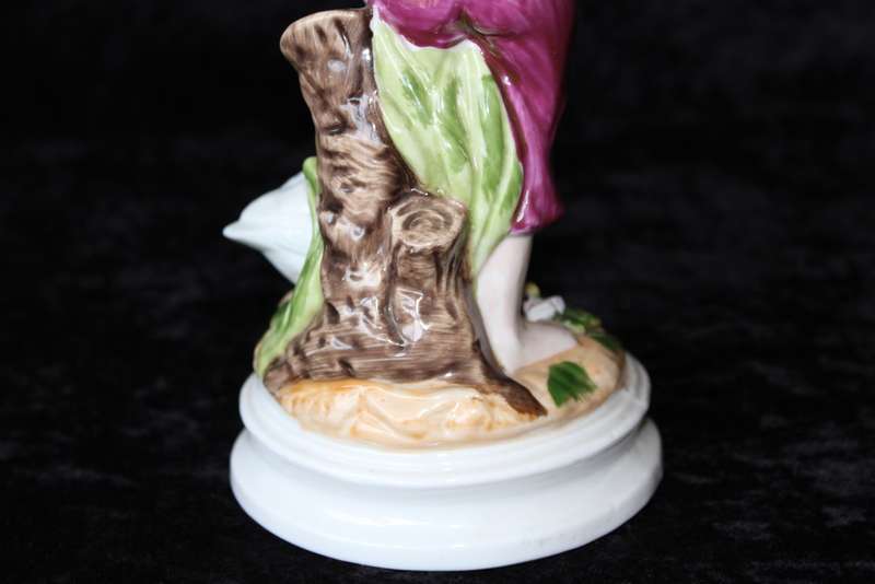 Porcelain Figurine of Boy and Swan