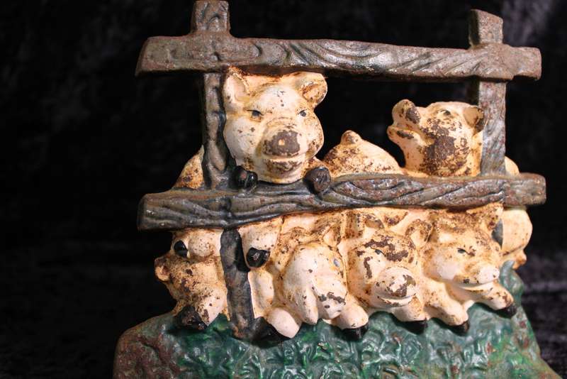 Vintage Cast Iron Pigs in a Den Doorstopper.