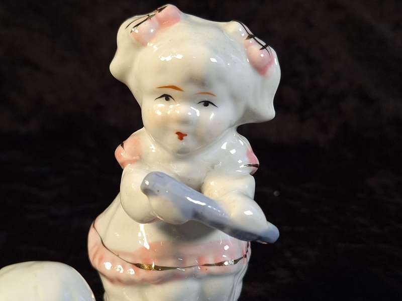 Porcelain Boy and Girl Figurine