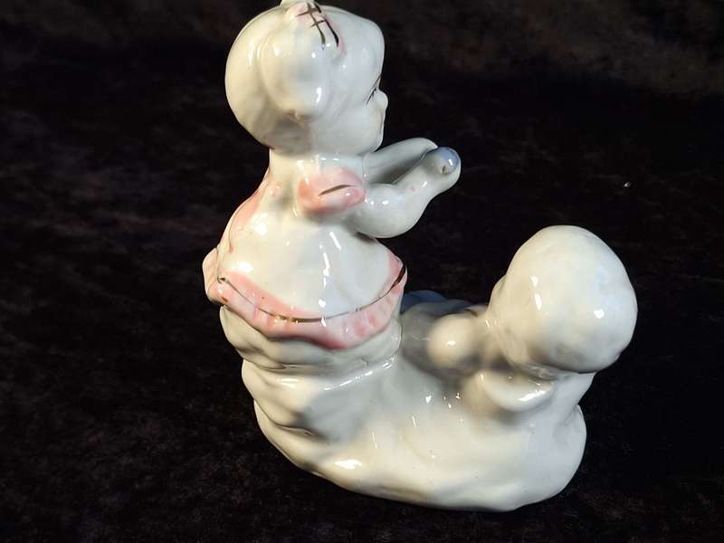 Porcelain Boy and Girl Figurine