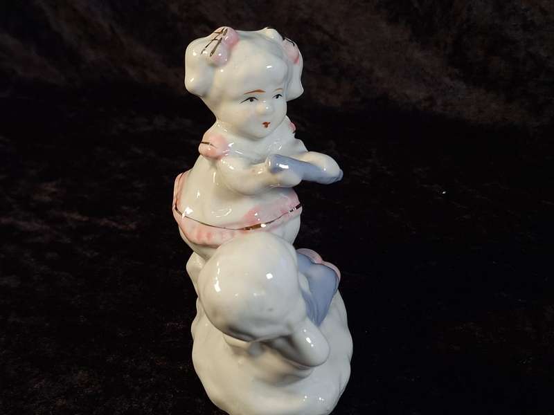 Porcelain Boy and Girl Figurine