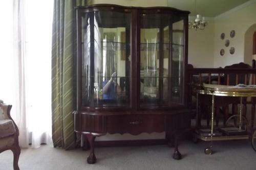 stunning wood and glass ball and claw  display cabinet.