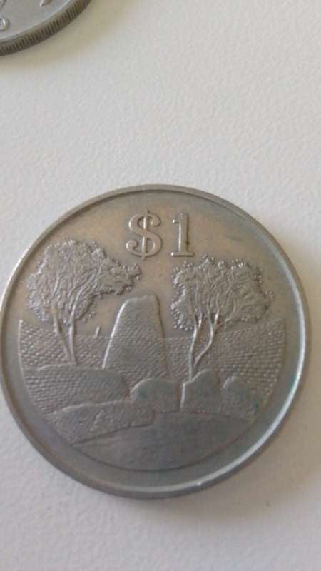 ZIMBABWE 1980 ONE DOLLAR COIN -NICKEL PLATED STEEL (BID PER COIN)
