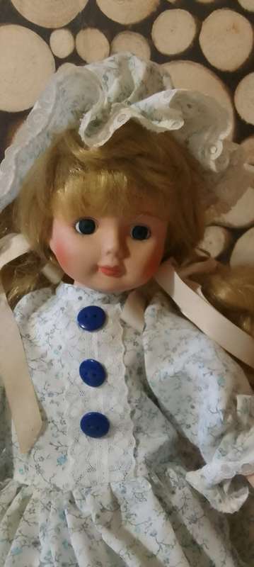Porcelain Doll - Little Miss - 37 cm long - with Wooden Stand