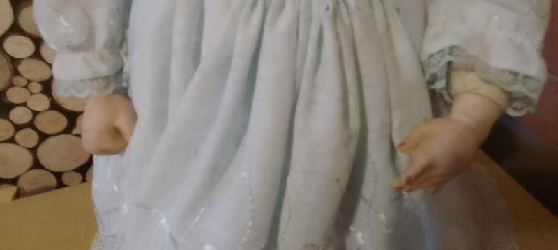PORCELAIN DOLL - Christening Doll- 55 cm long - ON WOODEN STAND