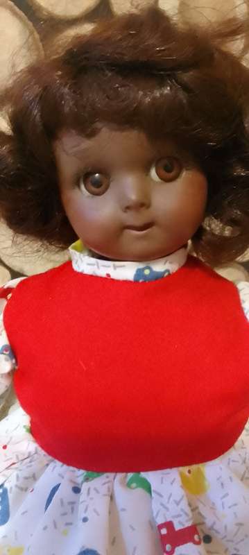 PORCELAIN DOLL - vintage small size- 40 cm long - ON STAND