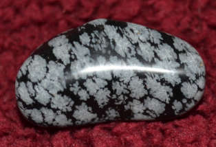 Large Snowflake Obsidian balance, purify, and ground one's mind, body, and aura.