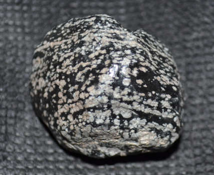 Rough Snowflake Obsidian activates our root and third eye chakras