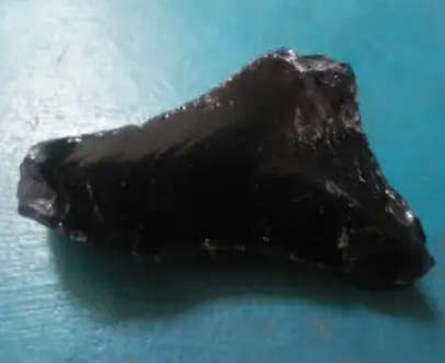 Large Black Obsidian naturally occurring volcanic glass that forms when molten lava cools quickly