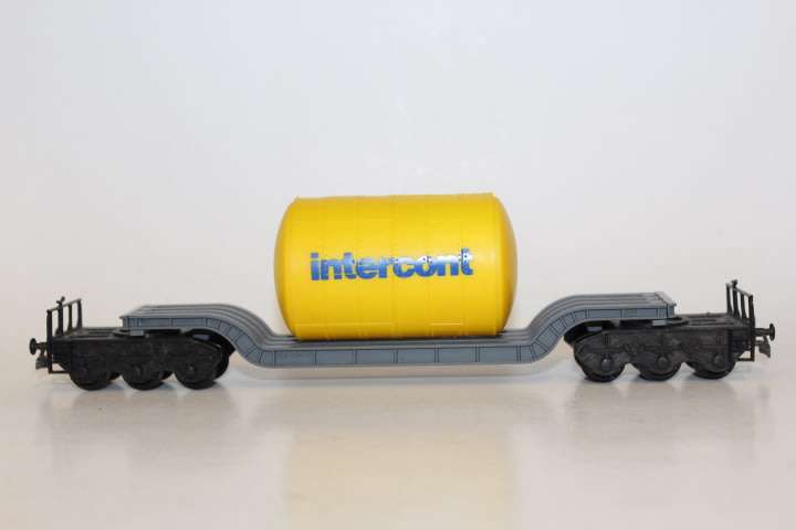 Flated Wagon with Intercon Tank Load