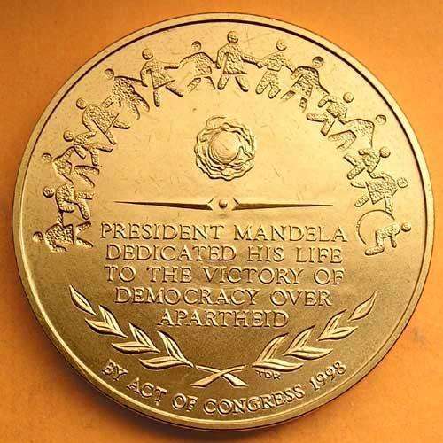 Get your piecxe of History!!!  By act of Congress Mandela Gold clad Medallion