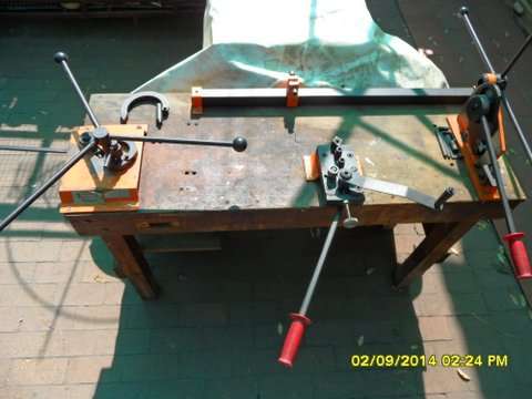Metal bender Mounted on Wooden Bench.