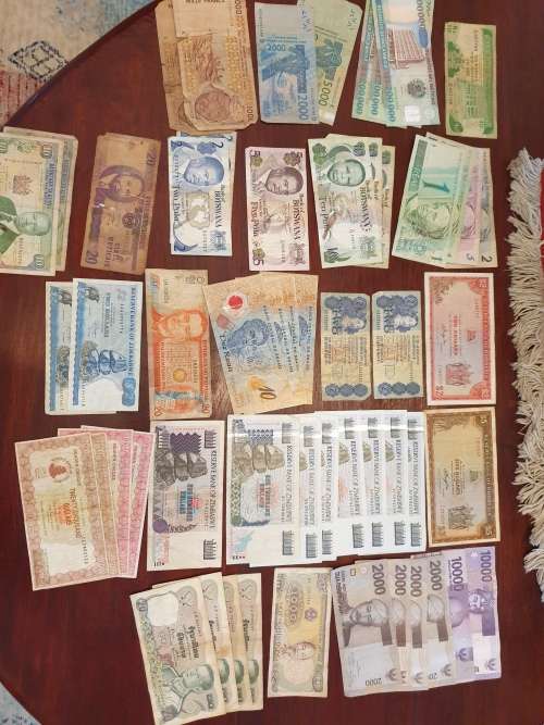 A large collection of banknotes.