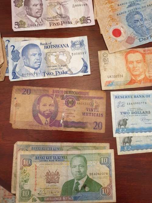A large collection of banknotes.