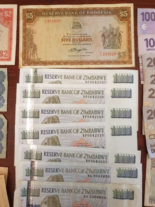 A large collection of banknotes.
