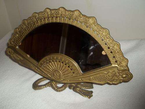 Magnifisant brass & mirror calender