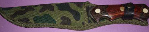 Knife in army colored pouch