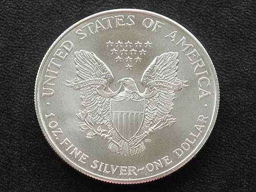 1oz .999 Fine Silver Liberty Dollar Uncirculated (Walking Liberty 2000 Series) in Protective Capsule   Information:  1oz .999 Fine Silver Liberty Dollar Uncirculated (Walking Liberty 2000 Series) in Protective Capsule One Troy Ounce is 31.10g (grams) Exact Bullion Dimensions (Removed from Plastic Case): Height: 40.6mm Thickness: 2.98mm Edge Type: Reeded Encased in Protective Acrylic Plastic Case The Value of Silver is Currently Seeing Incredible Increases in Price in Recent Months As seen at http://en.wikipedia.org/wiki/American_Silver_Eagle (official dimensions listed) - link from the official Pan American Silver Corp website Please See Photos Below for further Details  Photos (Same as Coin Except Mintmark on Reverse is the Same as Shown on Wikipedia - "W" Bottom Left Below Eagle Claw):