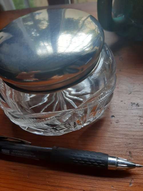 Crystal container with silver lid