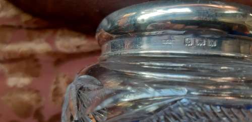 Crystal container with silver lid