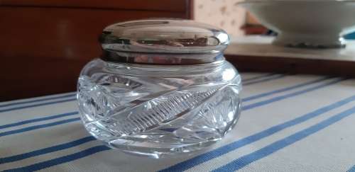 Crystal container with silver lid