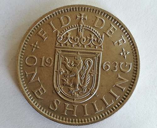 1963 FID*DEF* BRITISH SHILLING (REGINA+ELIZABETH) IN EXCELLENT CONDITION.