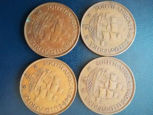 RARE 1938, 1940, 1945 AND 1949 UNION OF SOUTH AFRICA ONE PENNY COINS. BID PER COIN FOR THE LOT.