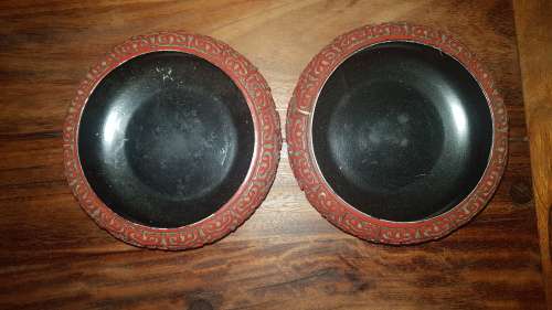 A PAIR OF CHINESE CARVED RED LACQUER POT