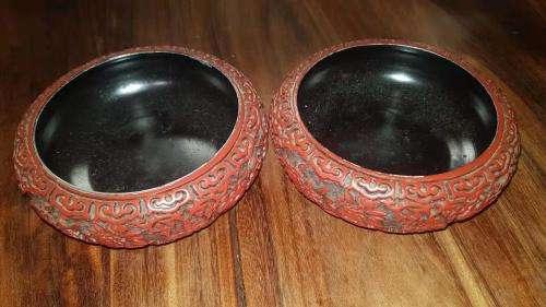 A PAIR OF CHINESE CARVED RED LACQUER POT