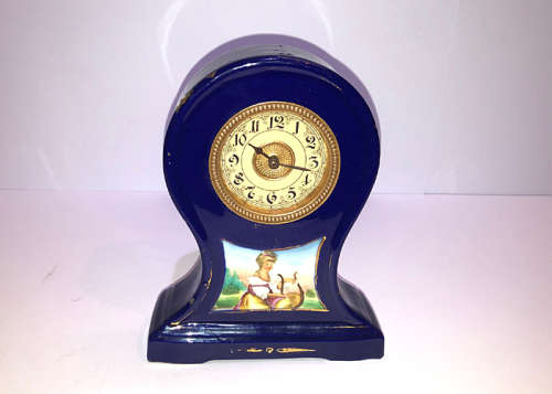 ANTIQUE PORCELAIN MANTEL CLOCK