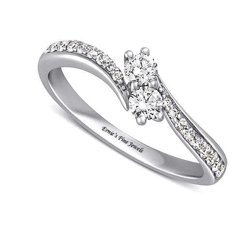 18 CT WHITE GOLD AND NATURAL DIAMOND ENGAGEMENT RING