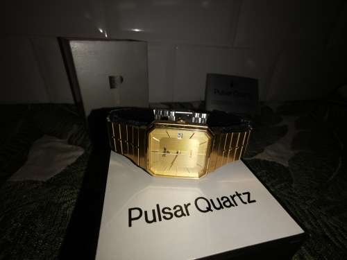 Vintage Pulsar Quartz in Origional Box with purchase guarantee coupon from 1985! (working)
