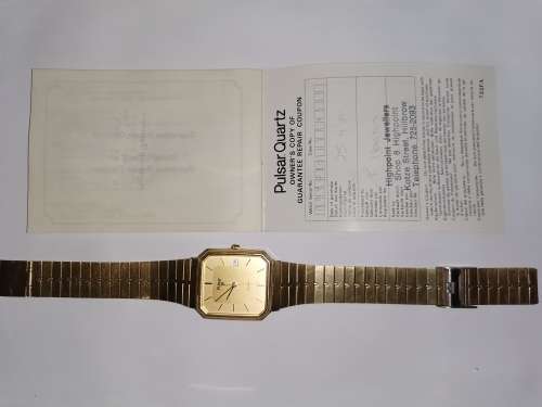 Vintage Pulsar Quartz in Origional Box with purchase guarantee coupon from 1985! (working)
