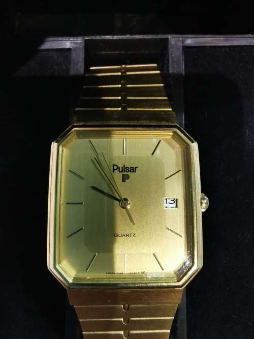 Vintage Pulsar Quartz in Origional Box with purchase guarantee coupon from 1985! (working)