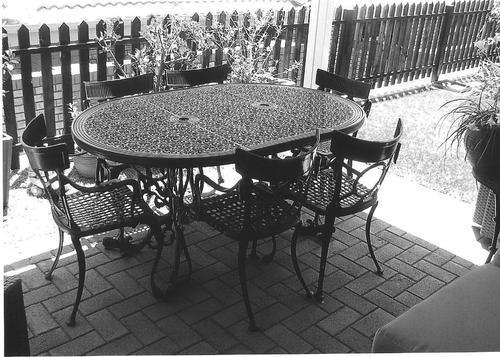 ALUMINIUM TABLE AND 6 CHAIRS