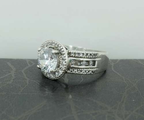 Solid 925 Silver Designer Engagement Ring, as per pictures posted.
