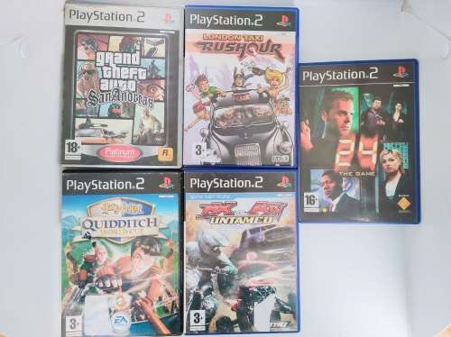 Sony Playstation 2 with 5 x Games, 2 x remotes and Steering control and all wires!!!