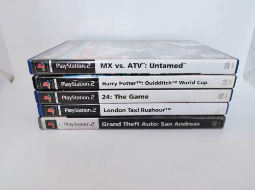 Sony Playstation 2 with 5 x Games, 2 x remotes and Steering control and all wires!!!