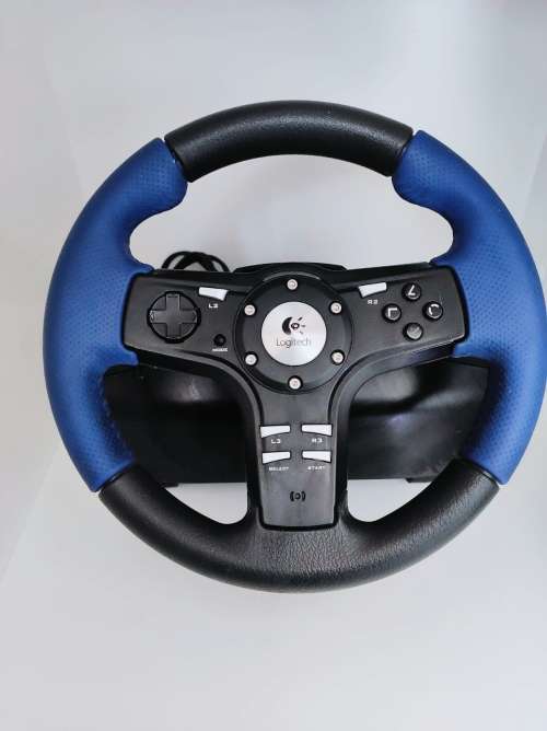 Sony Playstation 2 with 5 x Games, 2 x remotes and Steering control and all wires!!!