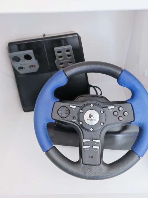 Sony Playstation 2 with 5 x Games, 2 x remotes and Steering control and all wires!!!