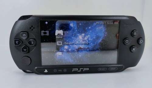 Sony PSP- E1004 with 5 x Games and all accessories, see full description please